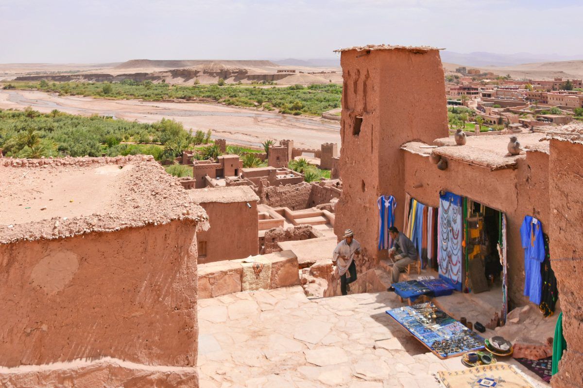 Earth-built houses and a craft shop in the ksar of Aït Ben Haddou above the river
