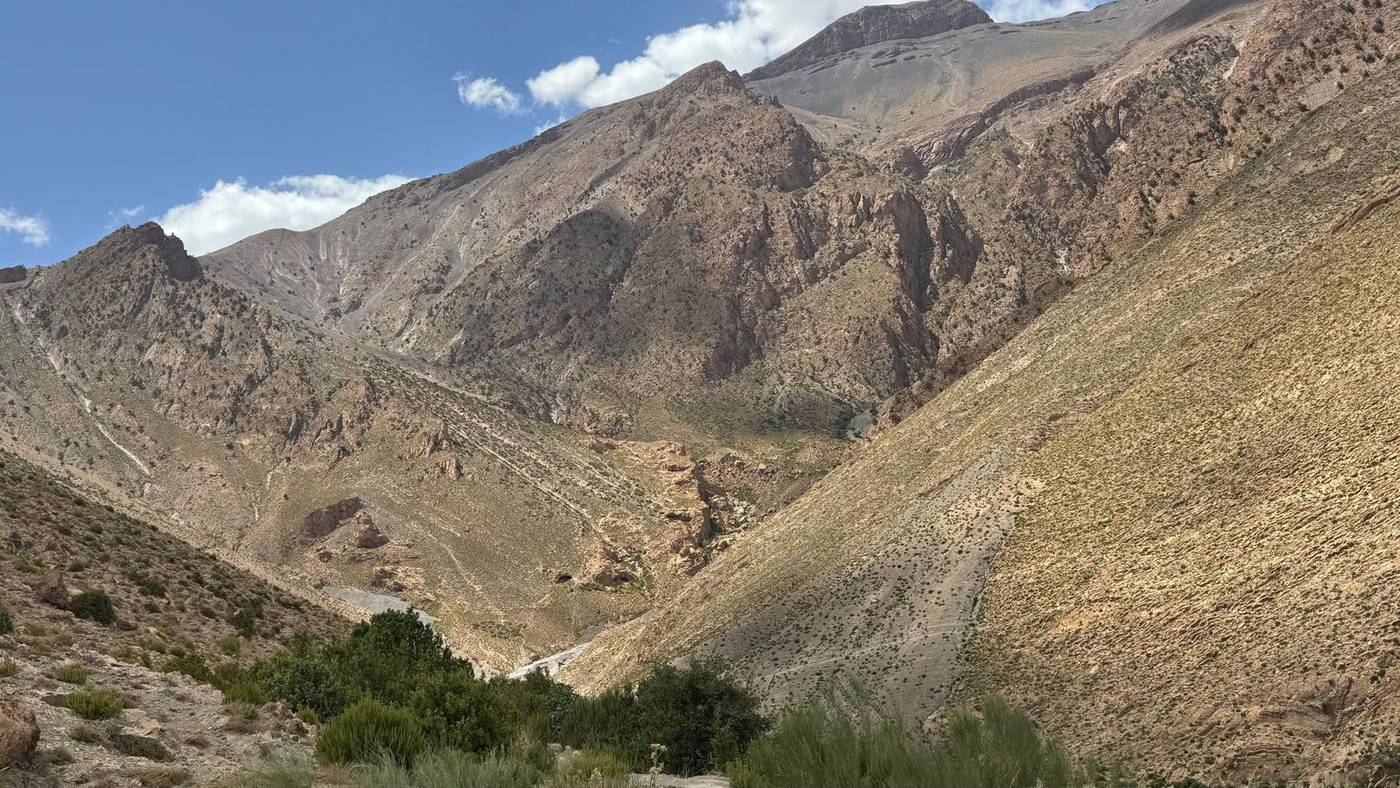 Steep valley and bare peaks in the High Atlas mountains on the road to Ouarzazate